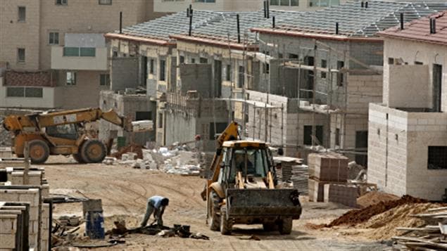 Construction de nouveaux logements dans la colonie d'Ariel, en Cisjordanie. Construction de nouveaux logements dans la colonie d'Ariel, en Cisjordanie.