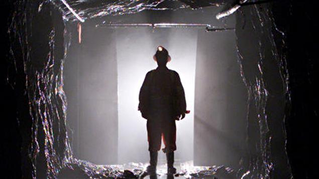 Un mineur dans une mine d'or Un mineur dans une mine d'or