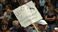 Manifestants réclamant une enquête publique sur l'industrie de la construction, à Montréal Manifestants réclamant une enquête publique sur l'industrie de la construction, à Montréal