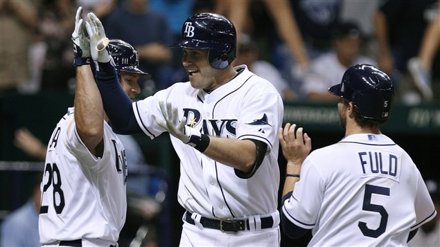 Evan Longoria célèbre après le premier de ses deux circuits. Evan Longoria célèbre après le premier de ses deux circuits.