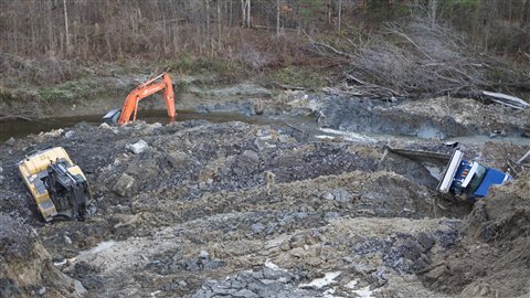 Véhicules lourds ensevelis Véhicules lourds ensevelis