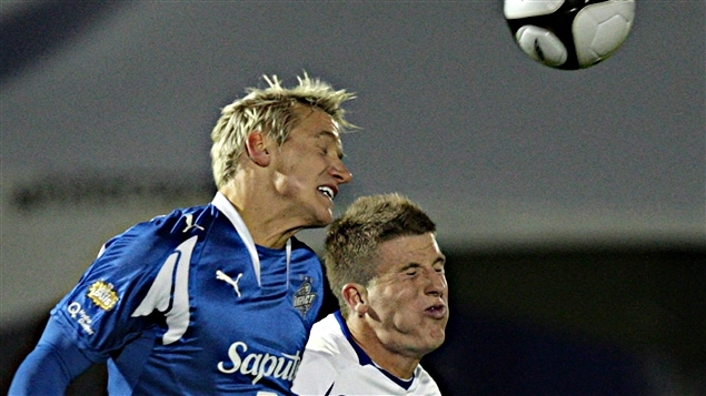 David Testo (à gauche), avec l'Impact en 2009 David Testo (à gauche), avec l'Impact en 2009