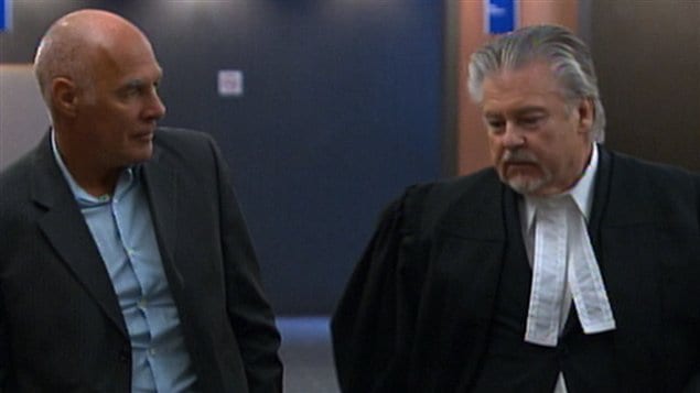 Jocelyn Dupuis (à gauche) avec son avocat au palais de justice de Montréal Jocelyn Dupuis (à gauche) avec son avocat au palais de justice de Montréal