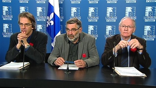 De gauche à droite, Mario Beauchemin, président de la Fédération des enseignants de cégep, Jean Trudelle, président de la Fédération nationale des enseignants du Québec et Max Roy, président de la Fédération québécoise des professeurs d'université. De gauche à droite, Mario Beauchemin, président de la Fédération des enseignants de cégep, Jean Trudelle, président de la Fédération nationale des enseignants du Québec et Max Roy, président de la Fédération québécoise des professeurs d'université.