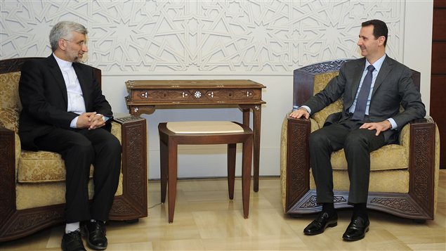 Le président syrien Bachar Al-Assad (à droite) et l'émissaire iranien Saïd Jalili Le président syrien Bachar Al-Assad (à droite) et l'émissaire iranien Saïd Jalili