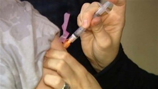 Un vaccin donné contre la grippe Un vaccin donné contre la grippe