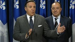 Le chef de la CAQ, François Legault, et le porte-parole du parti en matière de Finances, Christian Dubé. Le chef de la CAQ, François Legault, et le porte-parole du parti en matière de Finances, Christian Dubé.