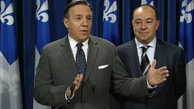 Le chef de la CAQ, François Legault, et le porte-parole du parti en matière de Finances, Christian Dubé. Le chef de la CAQ, François Legault, et le porte-parole du parti en matière de Finances, Christian Dubé.