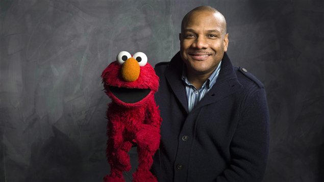 Kevin Clash et la marionnette d'Elmo Kevin Clash et la marionnette d'Elmo