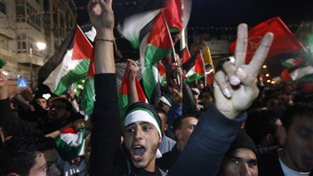 Des Palestiniens en liesse dans les rues de Ramallah. Des Palestiniens en liesse dans les rues de Ramallah.