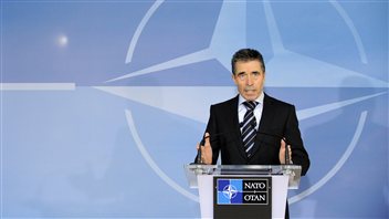 Le secrétaire général de l'OTAN, Anders Fogh Rasmussen, lors d'une réunion des ministres des Affaires étrangères des pays de l'OTAN à Bruxelles, mardi. Le secrétaire général de l'OTAN, Anders Fogh Rasmussen, lors d'une réunion des ministres des Affaires étrangères des pays de l'OTAN à Bruxelles, mardi.
