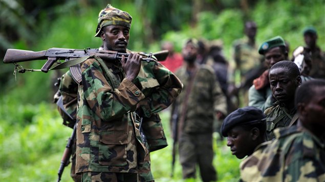 Des rebelles du M23 dans le village de Karuba, dans l'est de la République démocratique du Congo. Des rebelles du M23 dans le village de Karuba, dans l'est de la République démocratique du Congo.