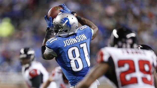 Le receveur éloigné Calvin Johnson Le receveur éloigné Calvin Johnson