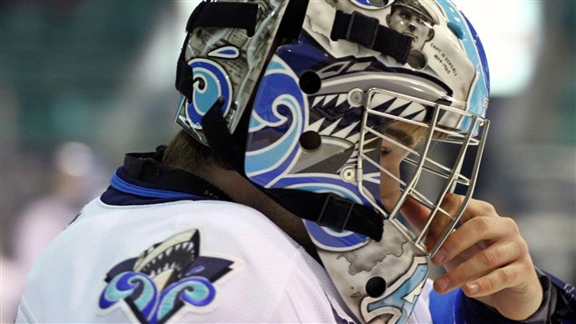 Le gardien de but Carl Hozjan, dans son uniforme de l'Océanic de Rimouski Le gardien de but Carl Hozjan, dans son uniforme de l'Océanic de Rimouski