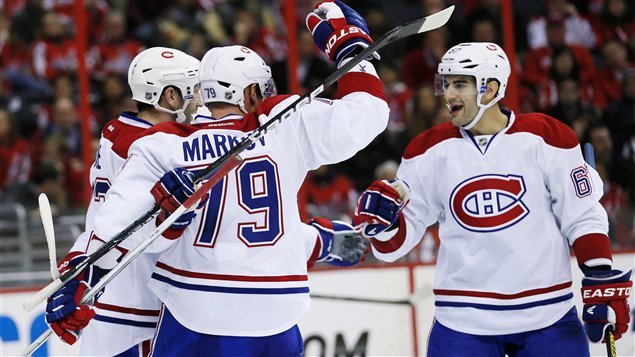 Eric Cole, Andrei Markov et Max Pacioretty Eric Cole, Andrei Markov et Max Pacioretty