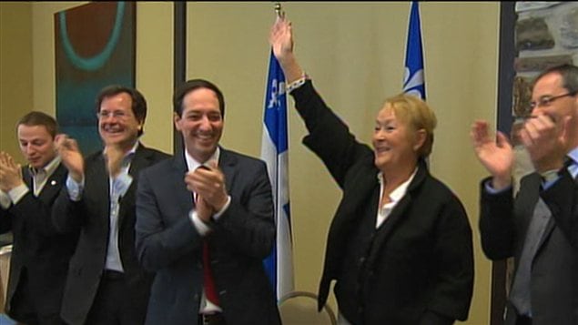 Le député Nicolsa Girard est à la droite de la première ministre Pauline Marois à l'ouverture du caucus du PQ. Le député Nicolsa Girard est à la droite de la première ministre Pauline Marois à l'ouverture du caucus du PQ.