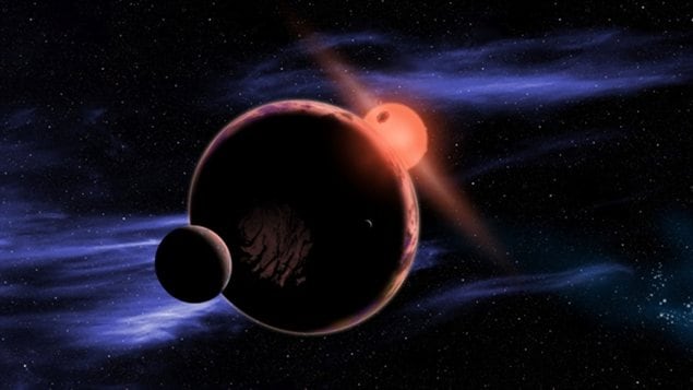 Représentation artistique d'une planète autour d'une naine rouge. Représentation artistique d'une planète autour d'une naine rouge.
