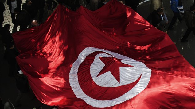Manifestation de militants du parti islamiste Ennahda dans les rues de Tunis, samedi 16 février. Manifestation de militants du parti islamiste Ennahda dans les rues de Tunis, samedi 16 février.