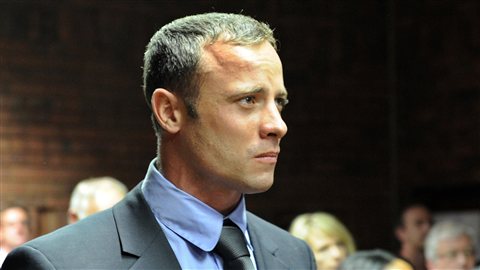 L'athlète handisport sud-africain Oscar Pistorius lors de sa comparution au tribunal de Pretoria le 19 février 2013. L'athlète handisport sud-africain Oscar Pistorius lors de sa comparution au tribunal de Pretoria le 19 février 2013.