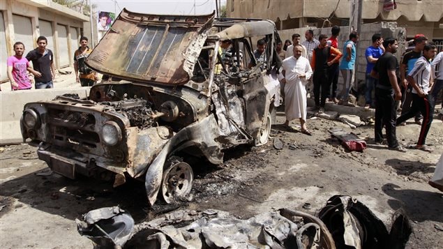 Site d'un attentat à la voiture piégée dans le quartier de Kamaliya, à Bagdad, en Irak Site d'un attentat à la voiture piégée dans le quartier de Kamaliya, à Bagdad, en Irak