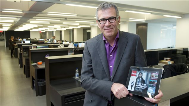 Guy Crevier, président et éditeur de La Presse, présente la version du quotidien conçue spécifiquement pour la tablette tactile. Guy Crevier, président et éditeur de La Presse, présente la version du quotidien conçue spécifiquement pour la tablette tactile.