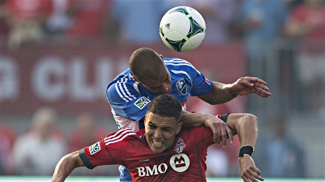 Luis Silva du Toronto FC et Matteo Ferrari de l'Impact de Montréal Luis Silva du Toronto FC et Matteo Ferrari de l'Impact de Montréal
