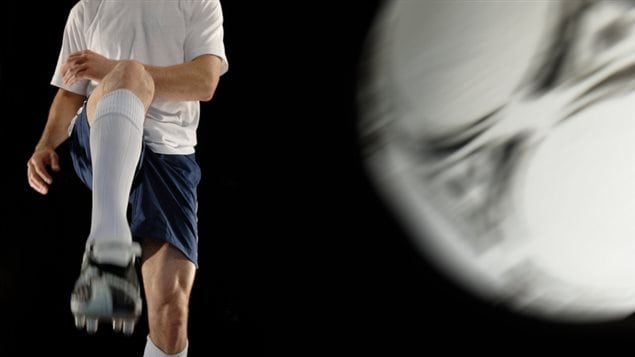 Un enfant et le soccer Un enfant et le soccer