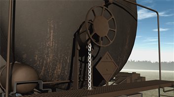 La roue qui est tournée à la main et qui, par la tension d’une chaîne, actionne les freins manuels. La roue qui est tournée à la main et qui, par la tension d’une chaîne, actionne les freins manuels.