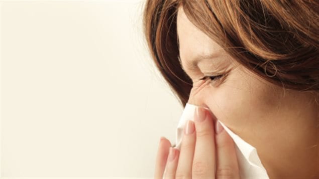 Femme atteinte de la grippe. Femme atteinte de la grippe.
