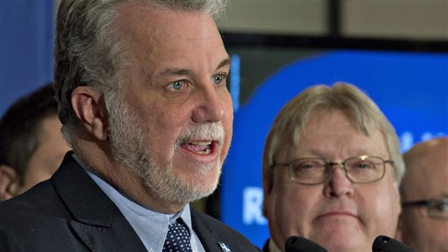Philippe Couillard en compagnie du candidat libéral et ancien président de la Fédération des médecins spécialistes du Québec, Gaétan Barrette Philippe Couillard en compagnie du candidat libéral et ancien président de la Fédération des médecins spécialistes du Québec, Gaétan Barrette