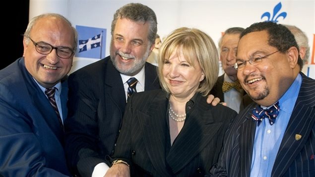 Philippe Couillard, l'ex-ministre libérale Monique Jérôme-Forget (au centre) et Arthur Porter (à droite), en 2007. Philippe Couillard, l'ex-ministre libérale Monique Jérôme-Forget (au centre) et Arthur Porter (à droite), en 2007.