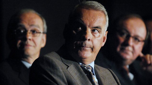 Alain Bouchard, en 2008, lors de l'assemblée de Couche-Tard, à Montréal Alain Bouchard, en 2008, lors de l'assemblée de Couche-Tard, à Montréal