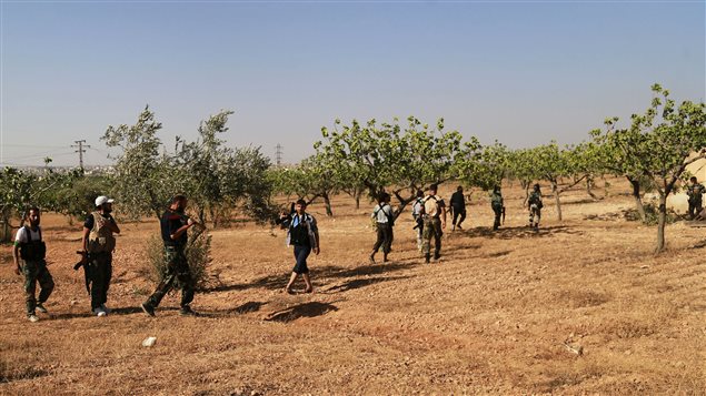 Des rebelles syriens dans la région d'Alep, dans le nord du pays. (archives) Des rebelles syriens dans la région d'Alep, dans le nord du pays. (archives)
