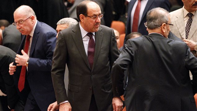 Le président d'Irak Nouri Al-Maliki, au centre, lors de la séance du Parlement, le 1er juillet, qui a été très chaotique. Le président d'Irak Nouri Al-Maliki, au centre, lors de la séance du Parlement, le 1er juillet, qui a été très chaotique.