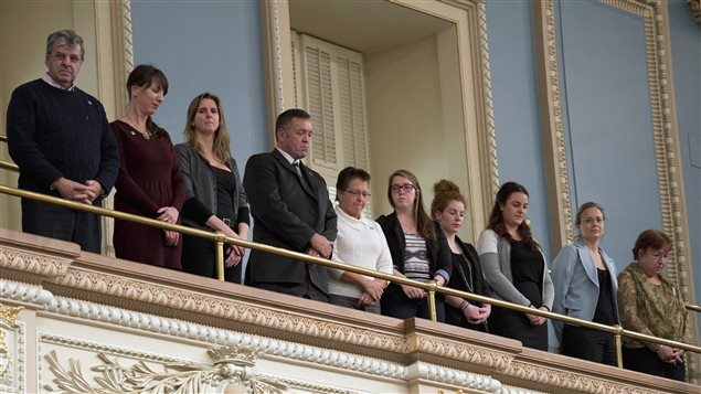 Des membres des familles endeuillées par la tuerie de l'école polytechnique de 1989 assistent à l'hommage rendu par les députés québécois pour la 25e commémoration de la tragédie. Des membres des familles endeuillées par la tuerie de l'école polytechnique de 1989 assistent à l'hommage rendu par les députés québécois pour la 25e commémoration de la tragédie.