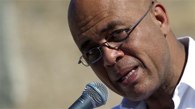 Le président haïtien, Michel Martelly, prend la parole durant une cérémonie de commémoration des cinq ans du séisme à Titanyen. Le président haïtien, Michel Martelly, prend la parole durant une cérémonie de commémoration des cinq ans du séisme à Titanyen.