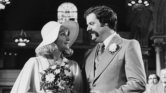 Doudou Désiré (Louise Deschâtelets) et Jean-Marie Dupuis (Claude Michaud) dans « Rue des pignons » en 1977. Doudou Désiré (Louise Deschâtelets) et Jean-Marie Dupuis (Claude Michaud) dans « Rue des pignons » en 1977.