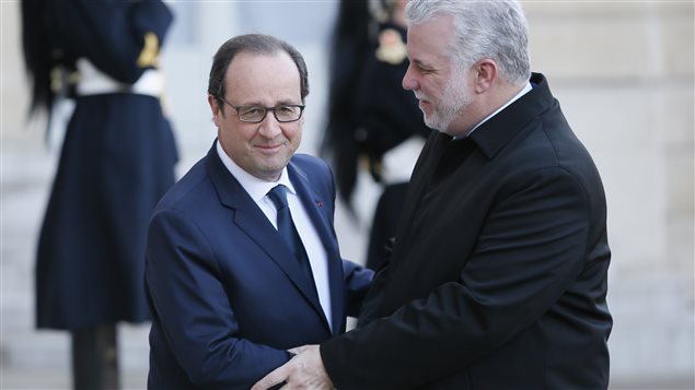Philippe Couillard et François Hollande à Paris Philippe Couillard et François Hollande à Paris