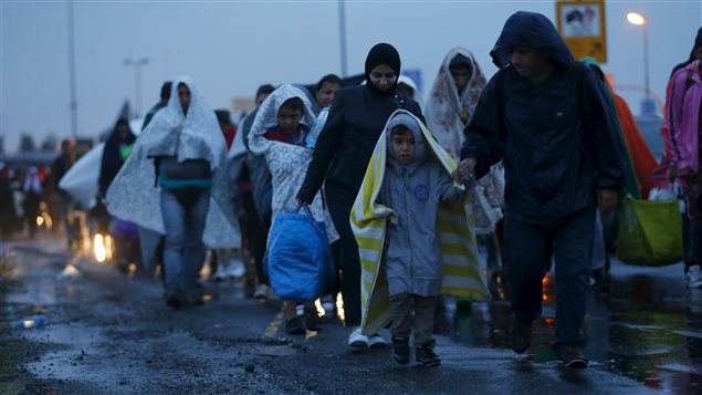 Des migrants syriens arrivent en Autriche Des migrants syriens arrivent en Autriche