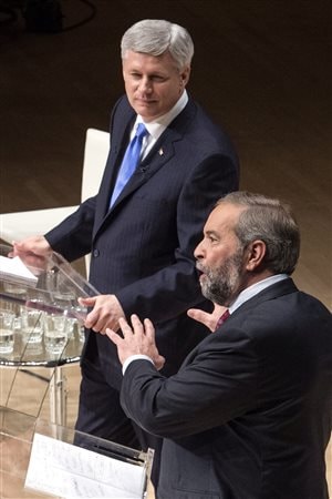 Stephen Harper et Thomas Mulcair lors du débat Munk Stephen Harper et Thomas Mulcair lors du débat Munk