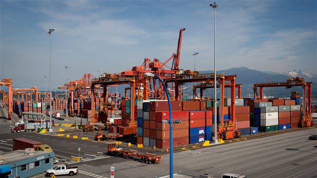 Cargo containers are stacked as cranes tower overhead at Port Metro Vancouver's Centerm container facility in Vancouver, B.C., on May 10, 2013. Cargo containers are stacked as cranes tower overhead at Port Metro Vancouver's Centerm container facility in Vancouver, B.C., on May 10, 2013.