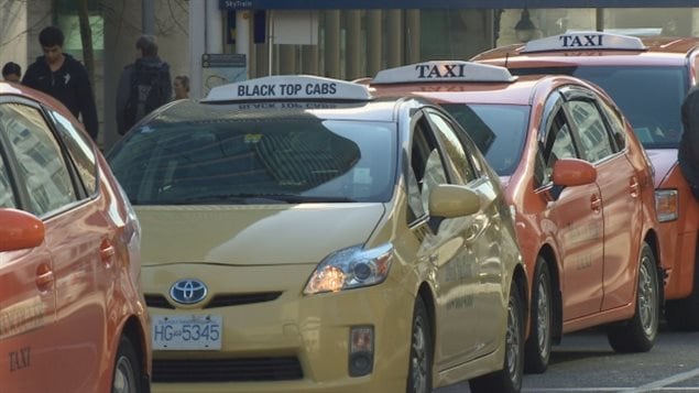 Une file de taxis à Vancouver. Une file de taxis à Vancouver.