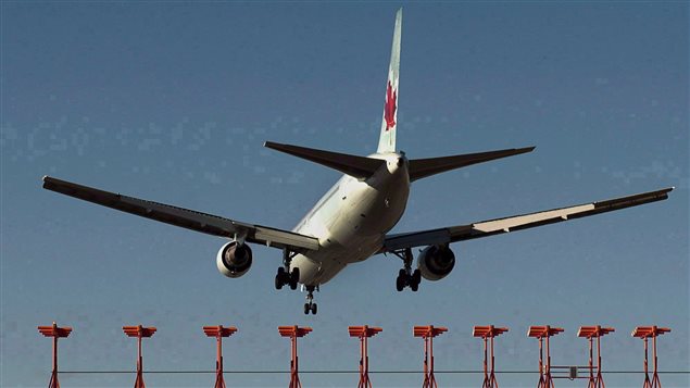 An Air Canada passenger jet is shown landing at Halifax Stanfield International Airport in Halifax on Jan. 21, 2013. A 47-year-old Alberta man has been charged after an incident on board an Air Canada flight en route to India was diverted back to Toronto early Wednesday morning. An Air Canada passenger jet is shown landing at Halifax Stanfield International Airport in Halifax on Jan. 21, 2013. A 47-year-old Alberta man has been charged after an incident on board an Air Canada flight en route to India was diverted back to Toronto early Wednesday morning.