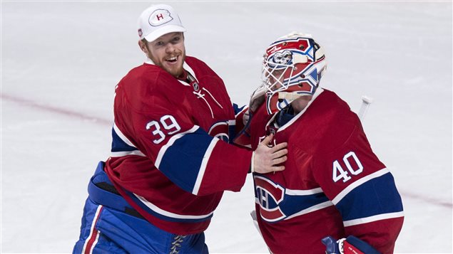 Mike Condon félicite Ben Scrivens après la victoire de 4-2. Mike Condon félicite Ben Scrivens après la victoire de 4-2.