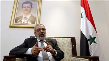Le ministre syrien de l’Information Omran Al-Zoubi. Le ministre syrien de l’Information Omran Al-Zoubi.