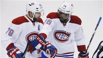 P.K. Subban félicite Andrei Markov après qu'il eut marqué son but en première période. P.K. Subban félicite Andrei Markov après qu'il eut marqué son but en première période.