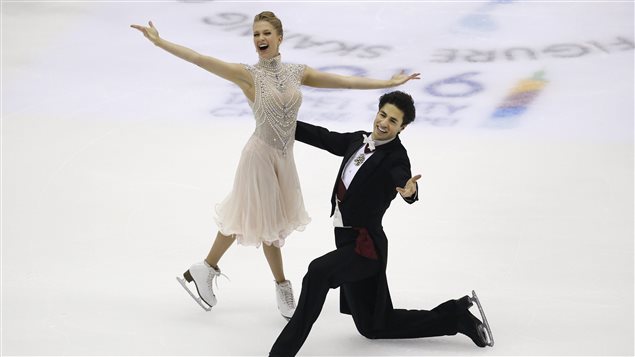 Kaitlyn Weaver et Andrew Poje au terme de leur programme court jeudi à Taïwan. Kaitlyn Weaver et Andrew Poje au terme de leur programme court jeudi à Taïwan.