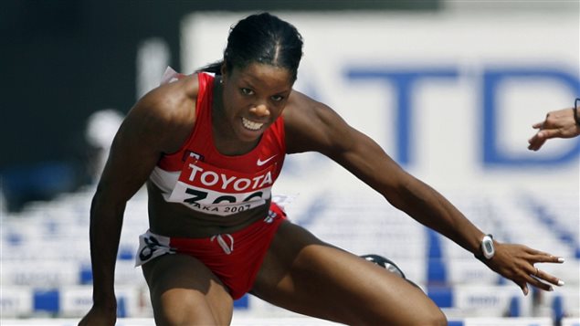 Perdita Felicien en plein saut au-dessus d'une haie, pendant un 100 m haies, au Championnat du monde d'athlétisme à Osaka en 2007. Perdita Felicien en plein saut au-dessus d'une haie, pendant un 100 m haies, au Championnat du monde d'athlétisme à Osaka en 2007.
