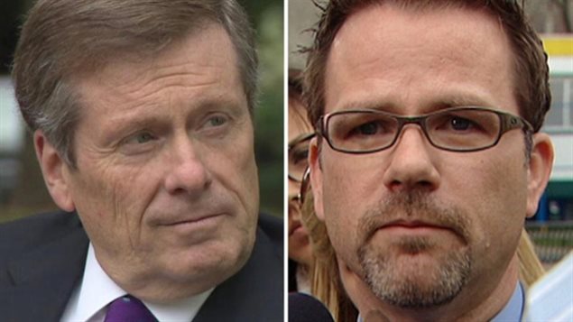Le maire de Toronto John Tory (à g.) et le président du local 79 du SCFP, Tim Maguire. Le maire de Toronto John Tory (à g.) et le président du local 79 du SCFP, Tim Maguire.