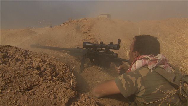 Un combattant kurde Un combattant kurde